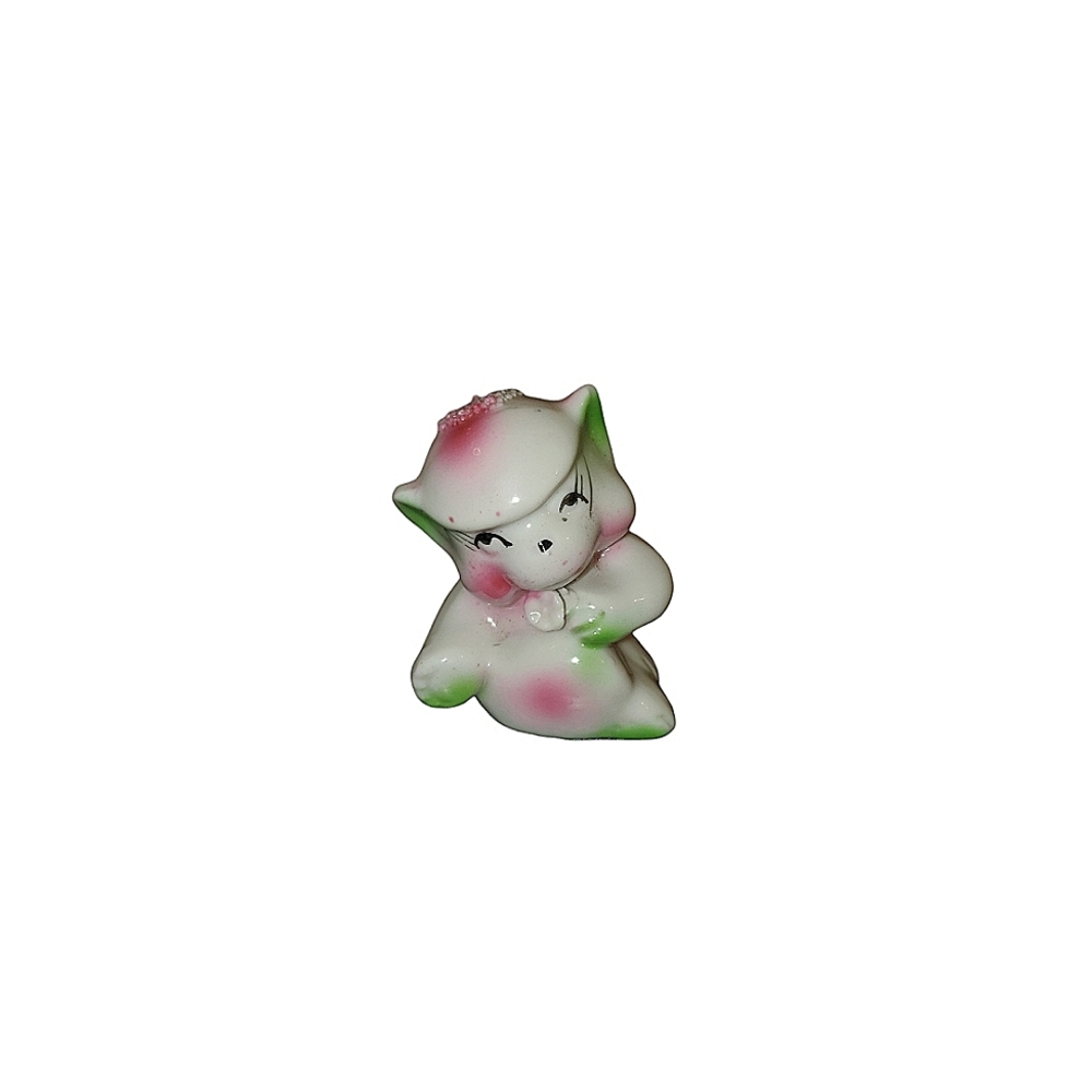 Cute little vintage animal figurine with pink green accents
